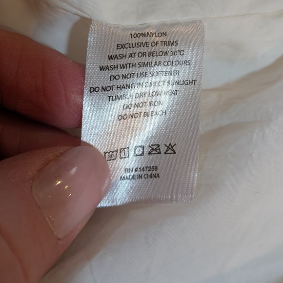 Women's Cream Puffer Vest - Picture 7 of 8